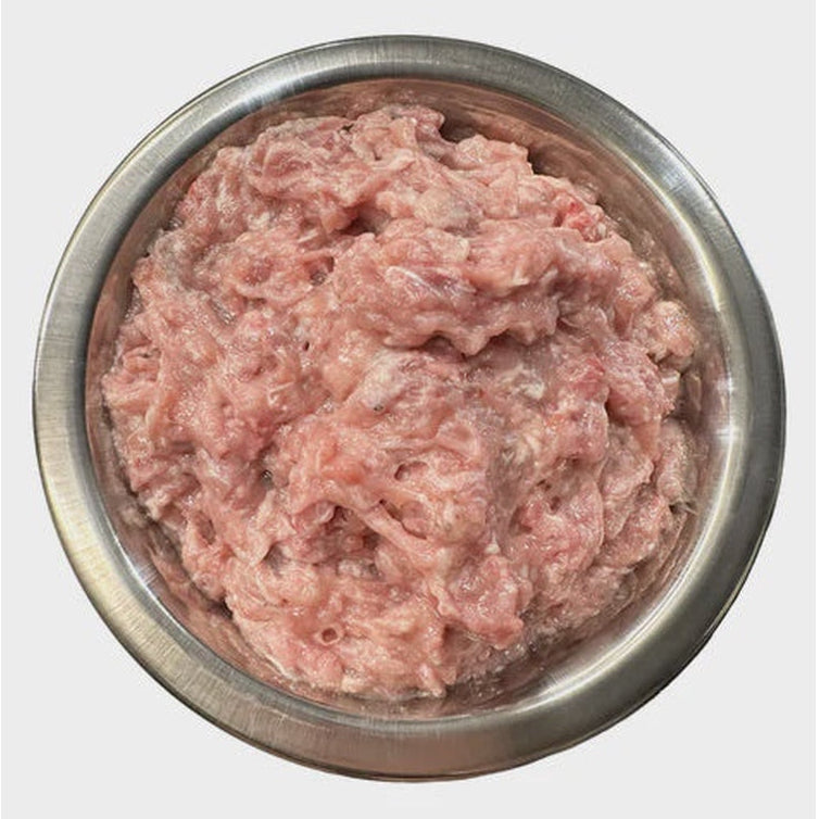 A bowl of raw quail mince for dogs.