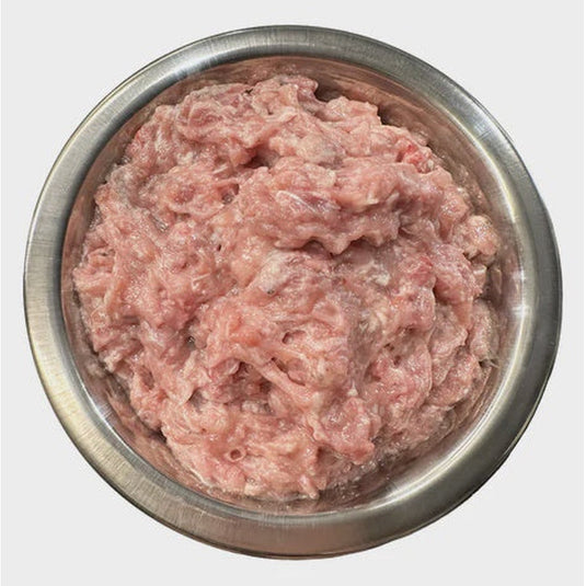A bowl of raw quail mince for dogs.